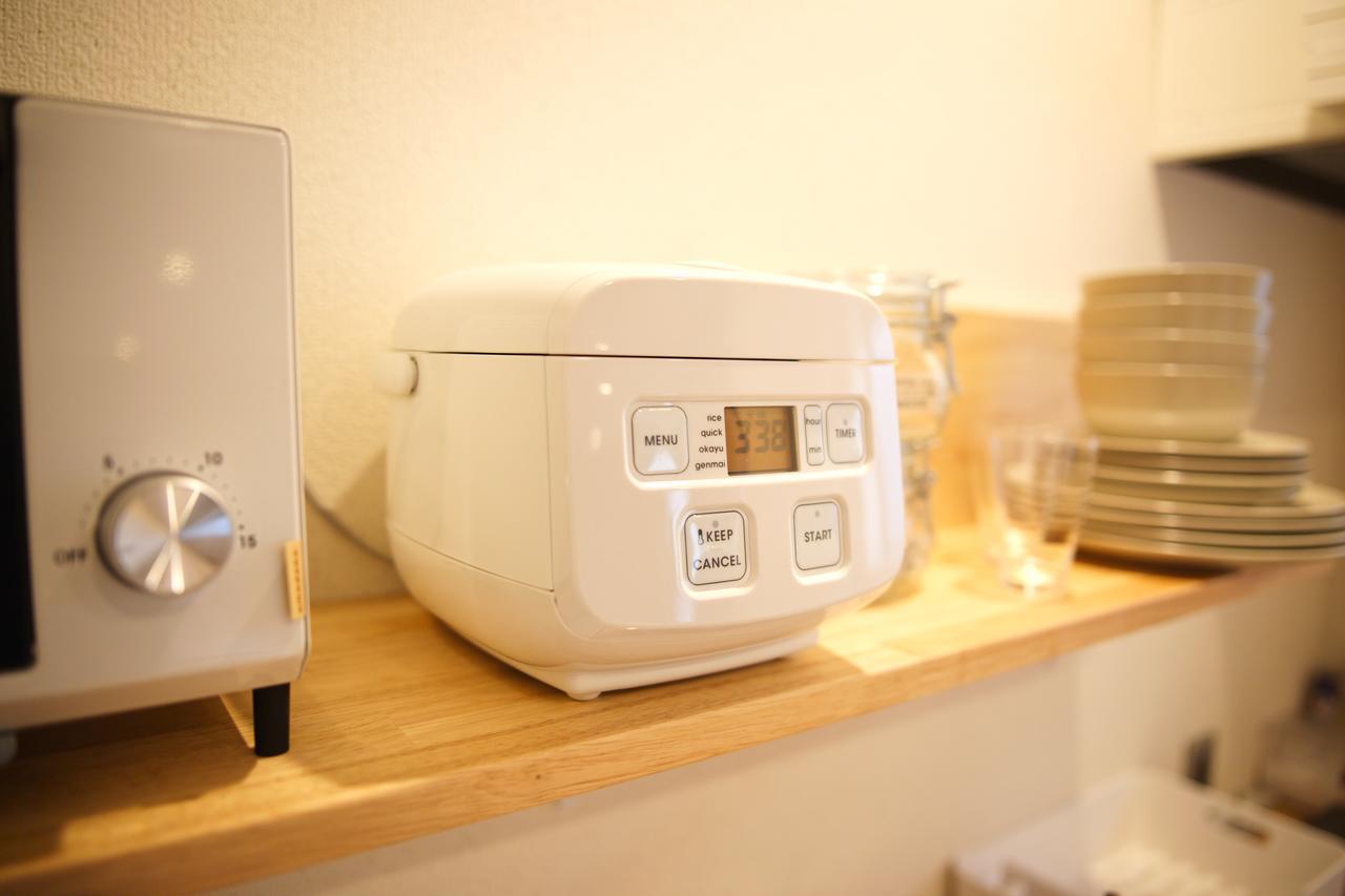 Konyamachi Guest House Kuku ทากามัตสึ ภายนอก รูปภาพ